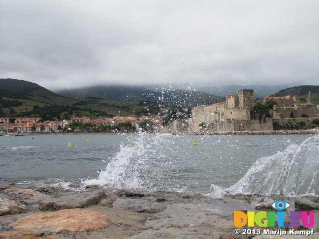 SX27423 Wave splashing against harbour wall in Collioure